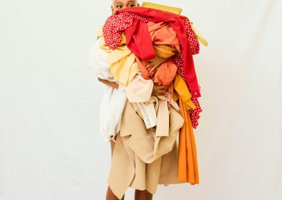 Person carrying clothes for Brooklyn laundry pickup service